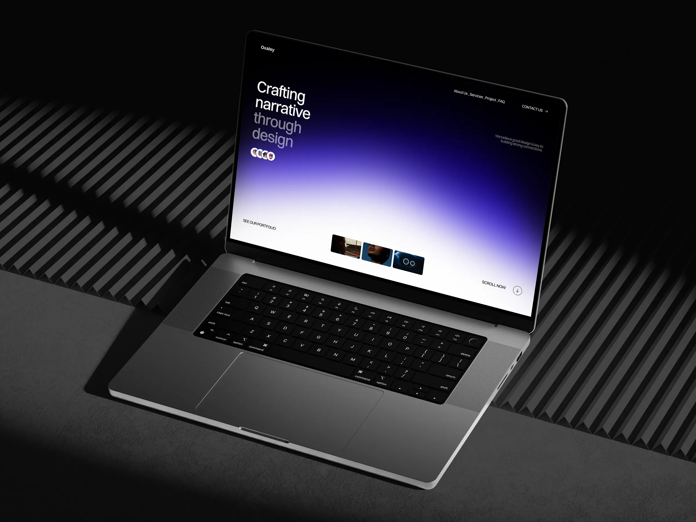 Oxaley agency website on a laptop